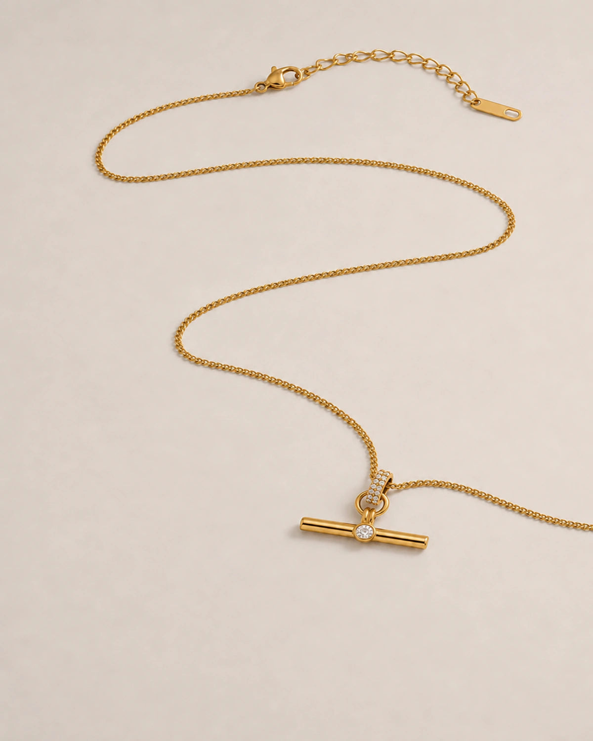 Alternate complete view of the Delphine gold toggle necklace with clasp and extender