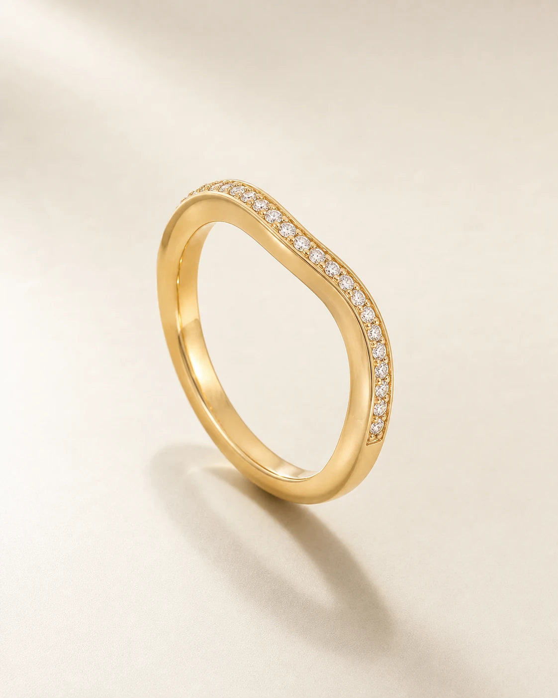 Aurelle pavé band on a pale stone surface