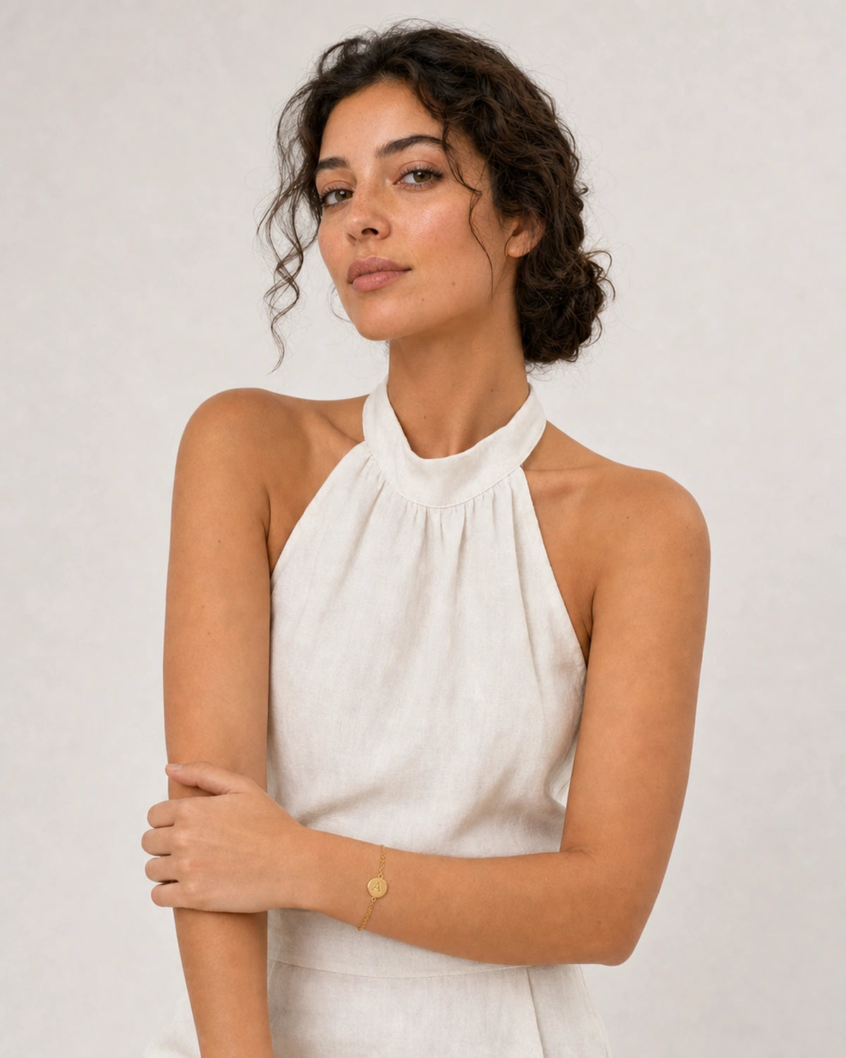 Alternate Amalfi summer portrait featuring the Amara gold A bracelet