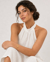 Human-scale Amalfi summer portrait showing the Amara A bracelet