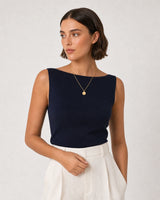 Human-scale Riviera portrait showing the Amara A medallion necklace