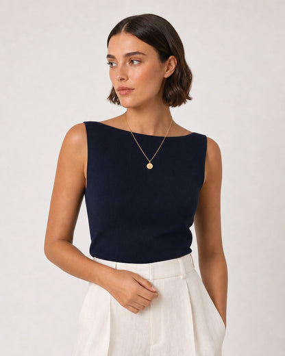 Human-scale Riviera portrait showing the Amara A medallion necklace