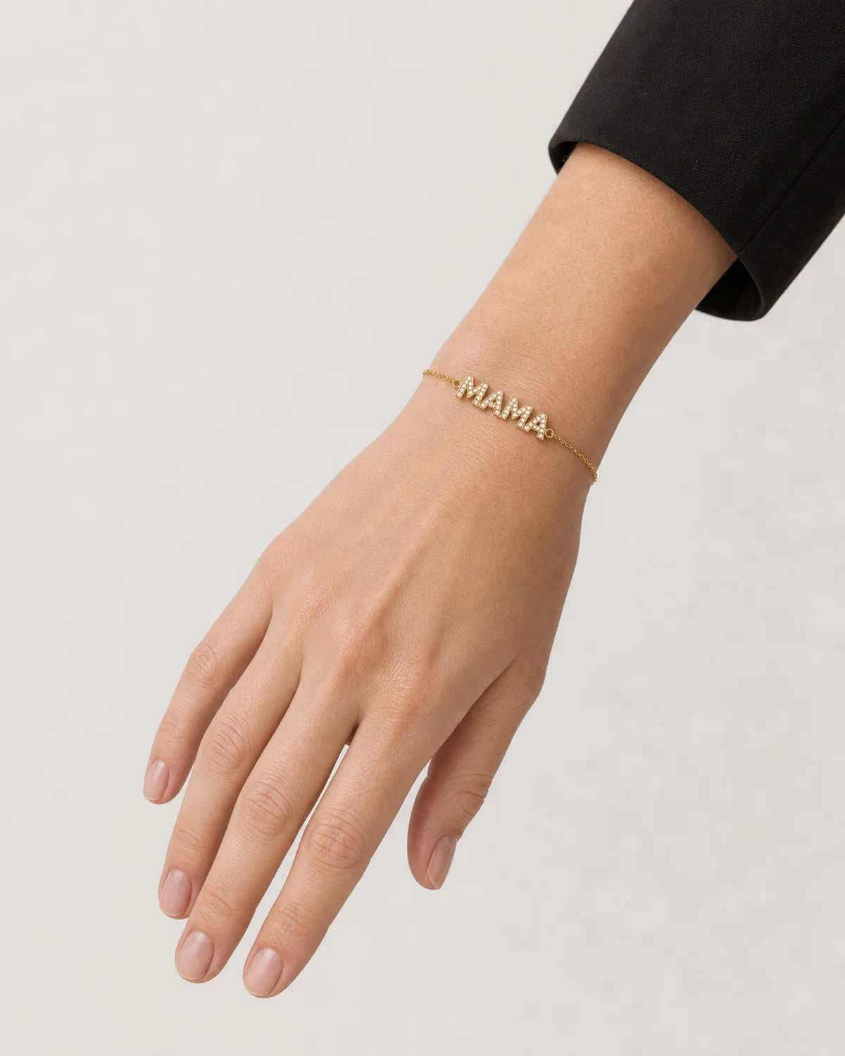 Human-scale wearing view of the Amaya pave MAMA bracelet