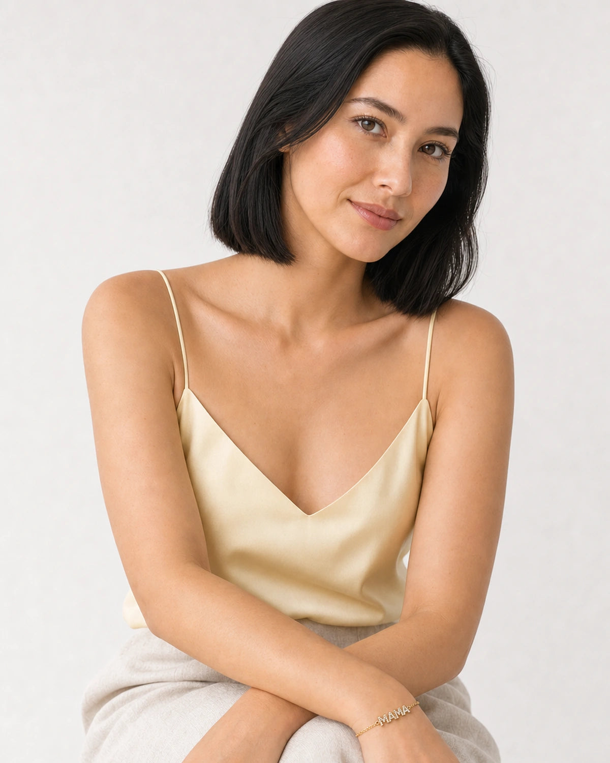 Human-scale Capri summer portrait showing the Amaya MAMA bracelet