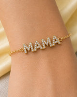 Extreme wrist macro of the Amaya MAMA letters, pave stones and side loops