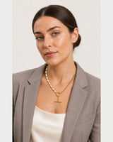 Three-quarter studio portrait featuring the Amélie toggle necklace