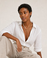 Human-scale Côte d’Azur portrait showing the Amélie pearl and chain necklace