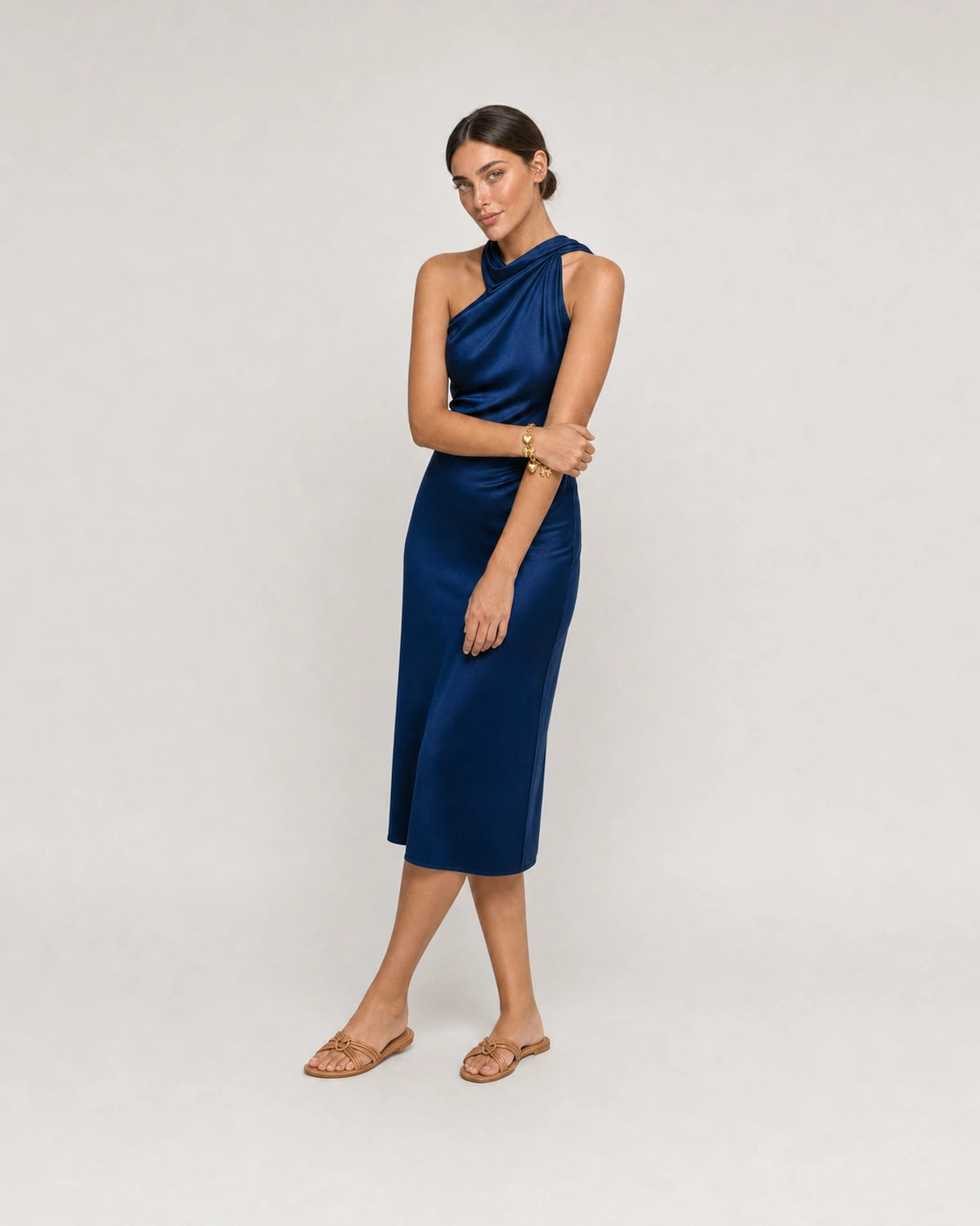 Full-body cobalt silk summer portrait featuring the Amorette bracelet