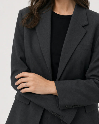 Australian model in black and white tailoring wearing the Amoura ring