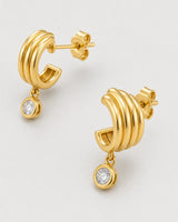 Front, reverse, post and butterfly-back construction view of the Astra earrings
