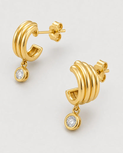 Front, reverse, post and butterfly-back construction view of the Astra earrings