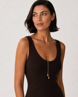 Alternate Lake Como portrait featuring the Aurelia gold lariat necklace