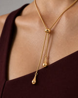 Extreme worn macro of the Aurelia snake chain, rounded slider, unequal tails and teardrops