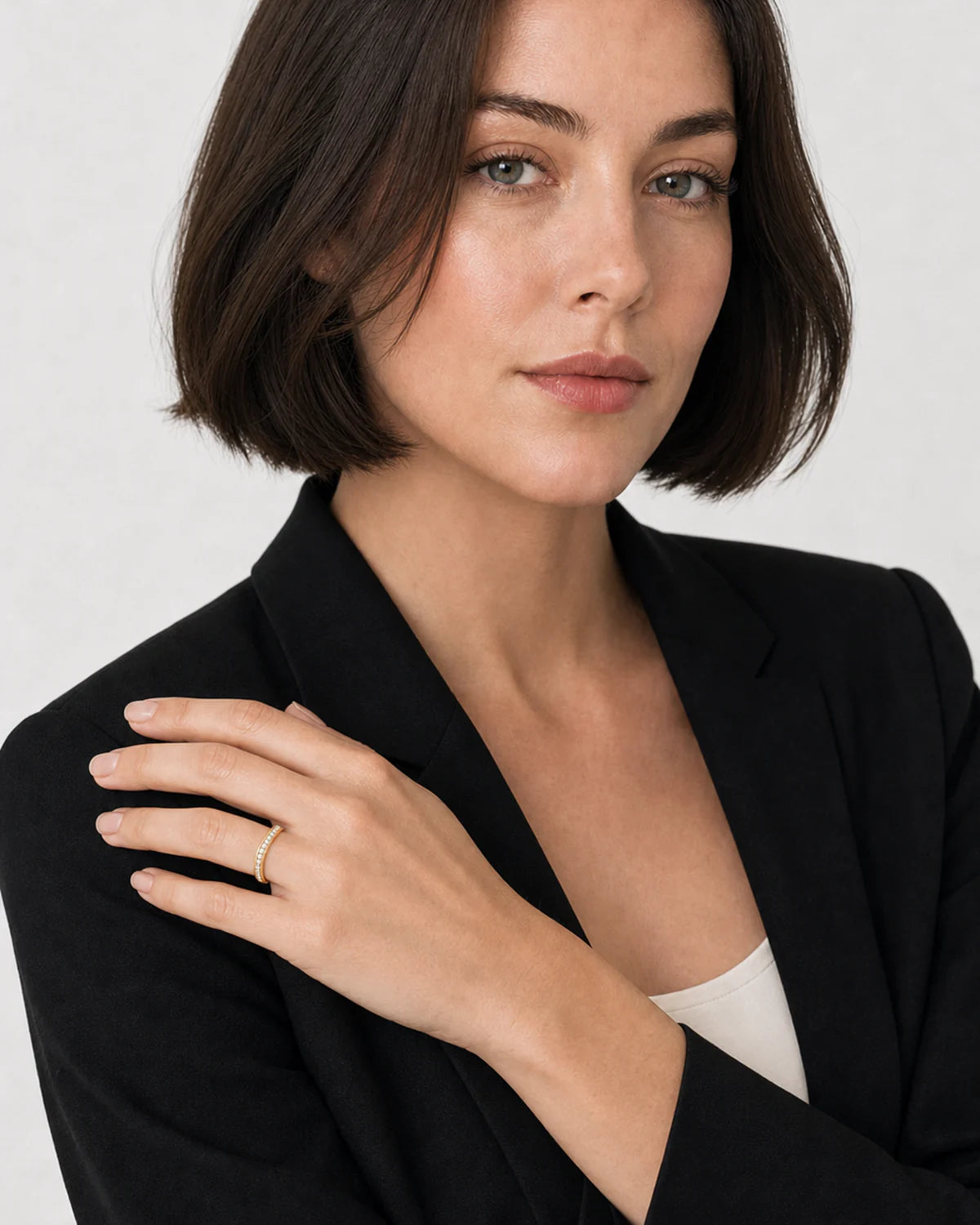 Alternate portrait of the same British model wearing the Aurelle pavé band