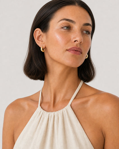 Alternate Amalfi summer portrait featuring the Aurelle gold open hoops