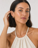 Human-scale Amalfi summer portrait showing the Aurelle gold hoops