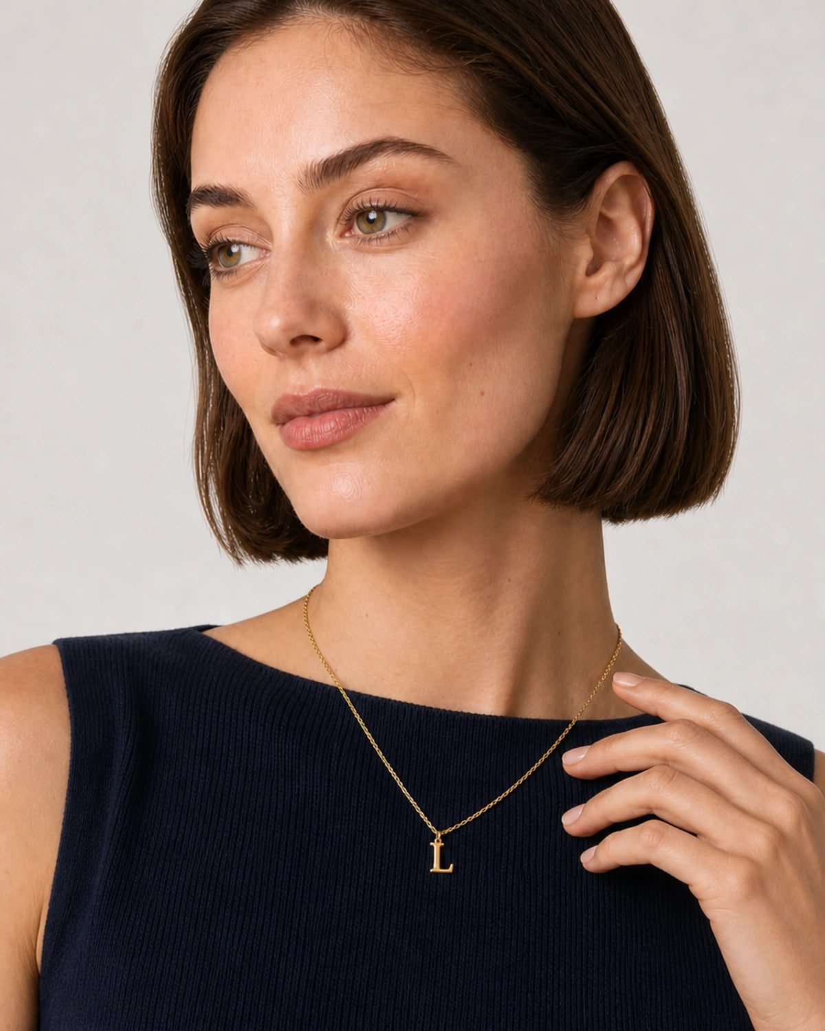 Alternate French Riviera summer portrait featuring the Aveline initial necklace