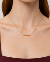 Complete true worn macro of the Aven bar and offset zircon station necklace