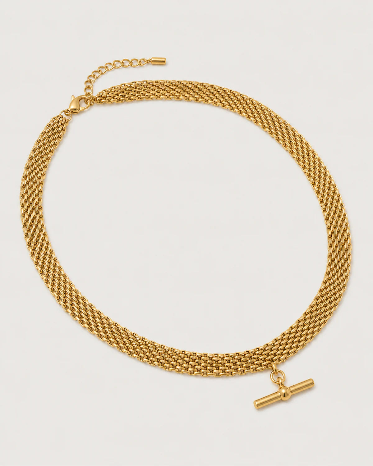 Camille five-row gold-tone collar in an alternate arrangement on pale grey
