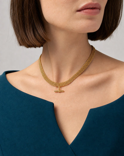 Three-quarter mouth-down wearing view of the Camille gold five-row collar