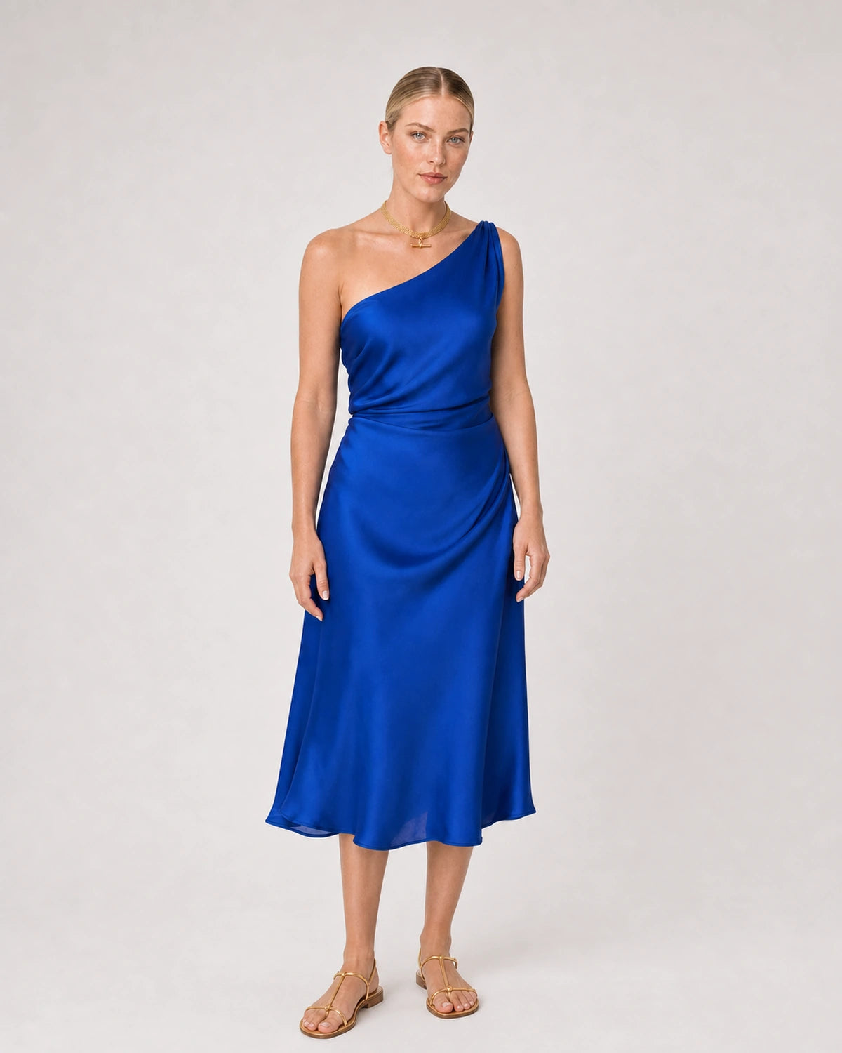 Full-body cobalt silk summer portrait featuring the Camille T-bar collar