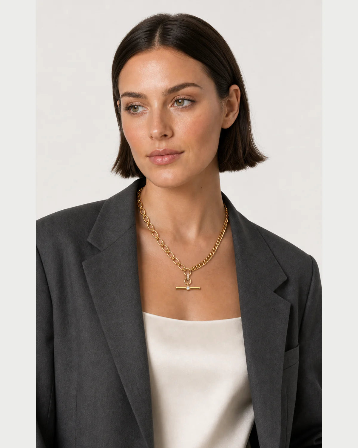 Three-quarter studio portrait featuring the Célestine T-bar necklace