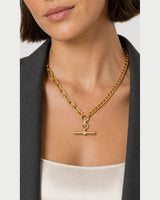 Close-up showing the Célestine mixed-link necklace worn at the collarbone