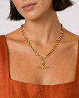 Close-up of the Célestine mixed-link necklace with terracotta summer styling