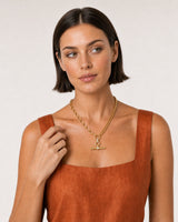 Human-scale summer styling portrait of the Célestine necklace