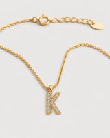 Macro detail of the Ciel upright pavé K pendant, spring-ring clasp and extender
