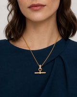 Eye-free front portrait of Beatrice wearing the Delphine pavé toggle necklace