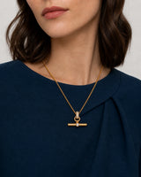 Eye-free three-quarter portrait of Beatrice wearing the Delphine necklace