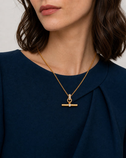 Eye-free oblique neckline view of Beatrice wearing the Delphine pavé necklace