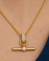 Complete worn macro of Beatrice wearing the Delphine pavé toggle necklace