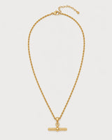 Elodie gold rope T-bar necklace on a pale dove-grey background