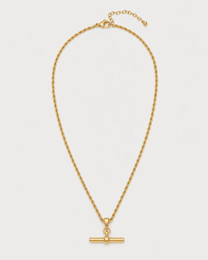 Elodie gold rope T-bar necklace on a pale dove-grey background