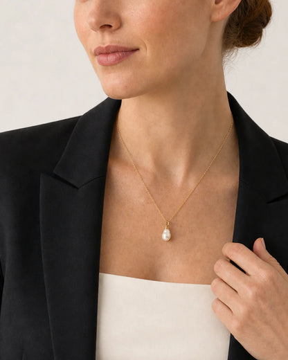 Close neckline portrait showing Elowen organic freshwater pearl