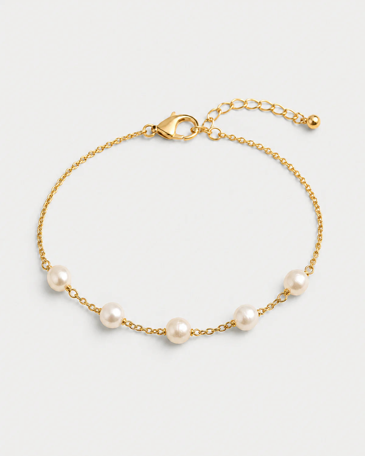 Elowen five-pearl station bracelet on pale dove-grey