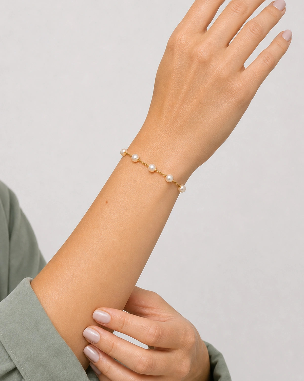 Supported-wrist view of all five Elowen pearl stations