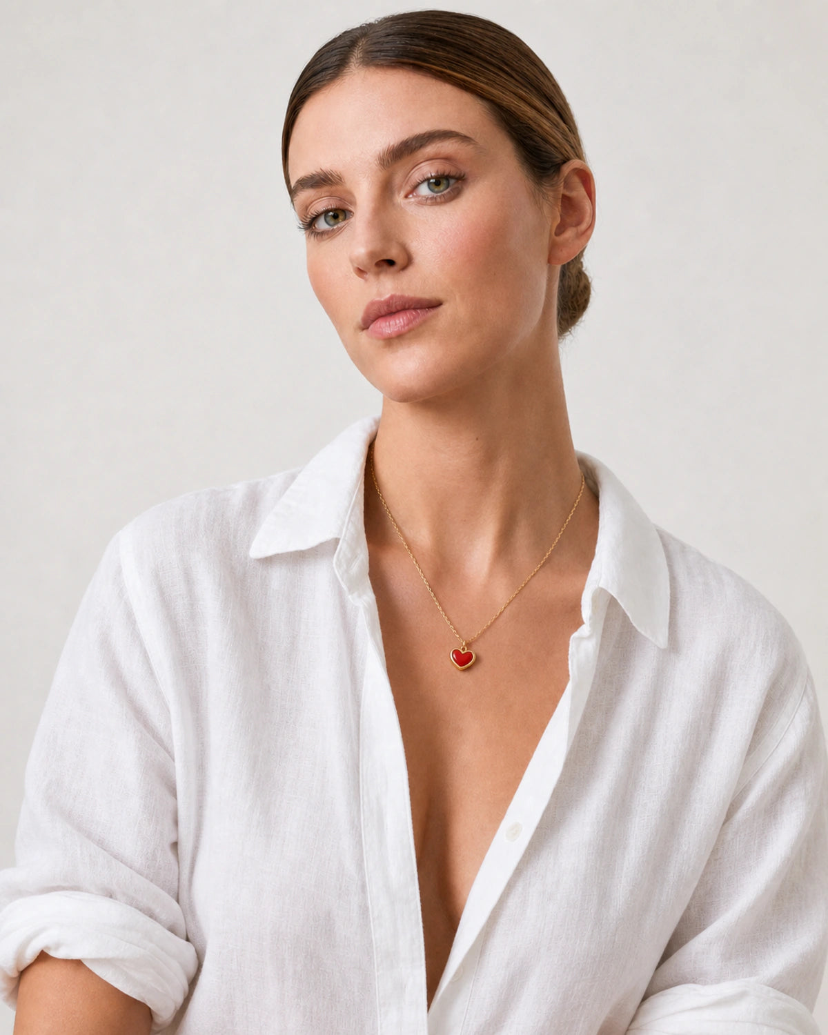 Alternate European-summer portrait featuring the Estelle red heart necklace