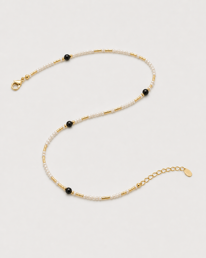 Open construction view of Isla choker with lobster clasp, extender chain and oval tag