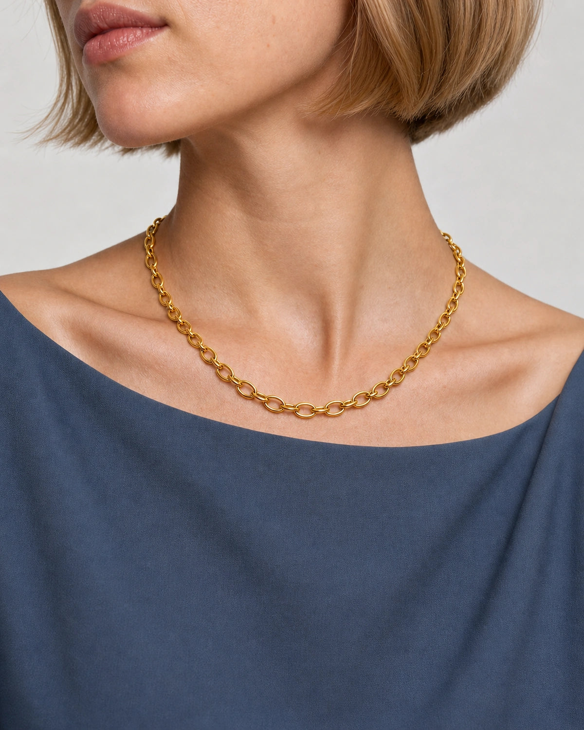 Alternate mouth-down wearing view of the Liora gold orbit-link necklace