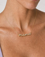 Extreme on-body macro of the Liora pave mama script and raised gold sidewall