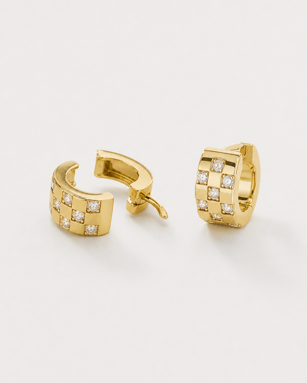 Alternate construction view of Lisette gold hinged huggies