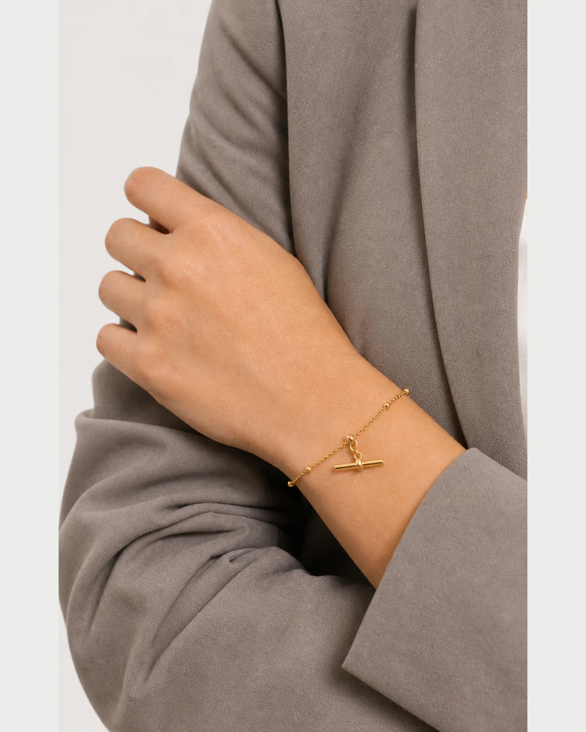 Clean wrist close-up showing the scale of the Lucille bracelet