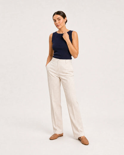 Wide studio portrait in navy and cream linen featuring the Lucille bracelet