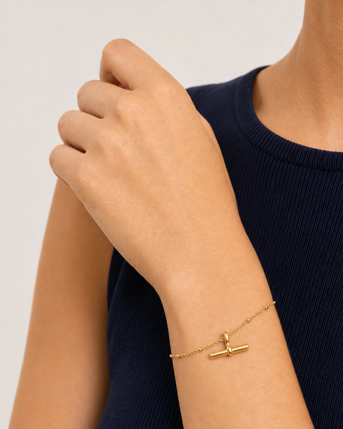 Close wrist view showing the scale of the Lucille beaded T-bar bracelet