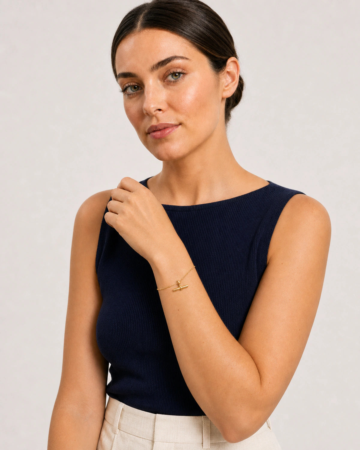 Human-scale Riviera styling portrait of the Lucille gold bracelet
