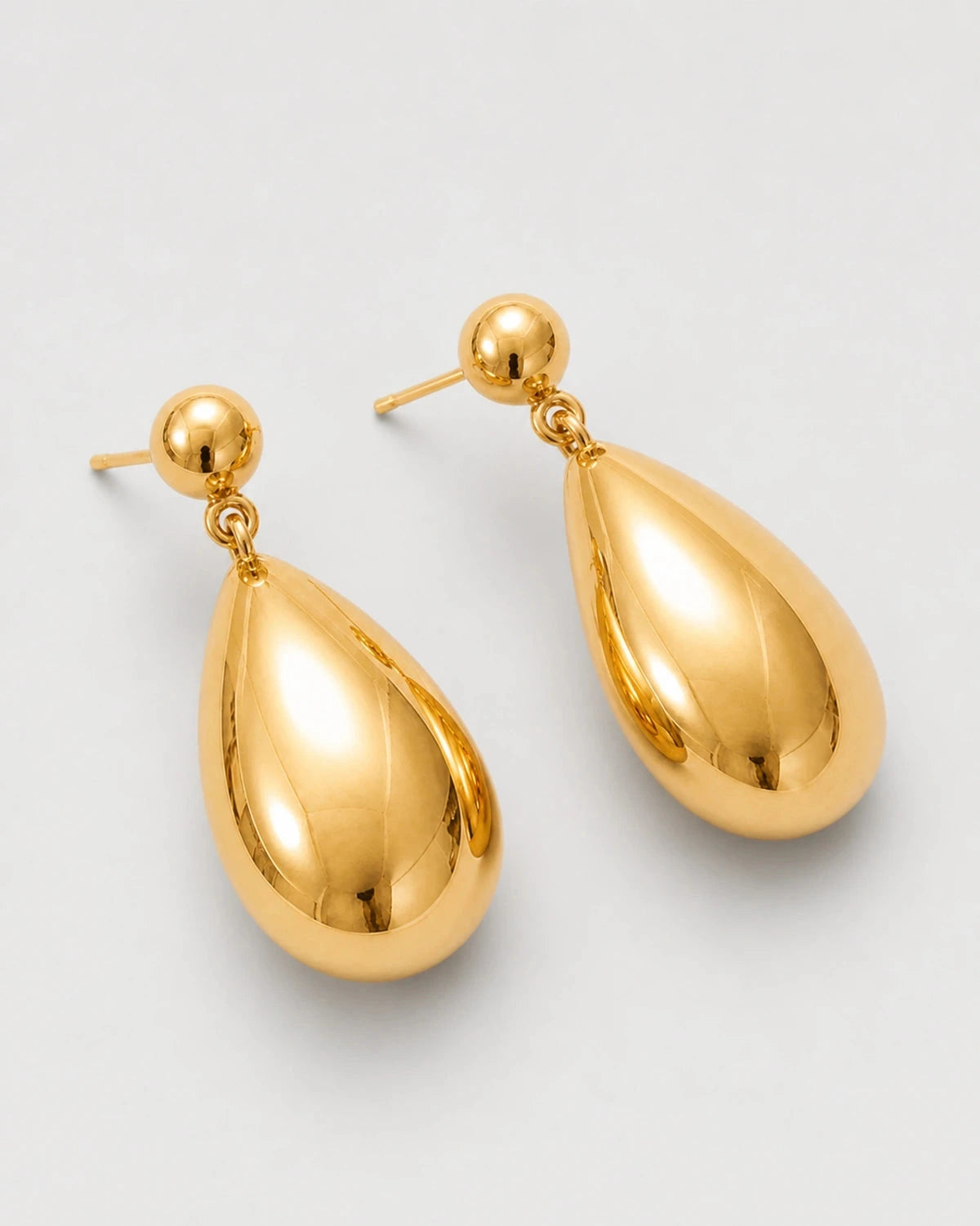 Alternate complete view of the Luma gold teardrop earrings and posts