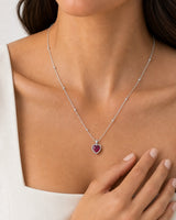 Editorial hand detail of Elise wearing the Maëlle silver station necklace